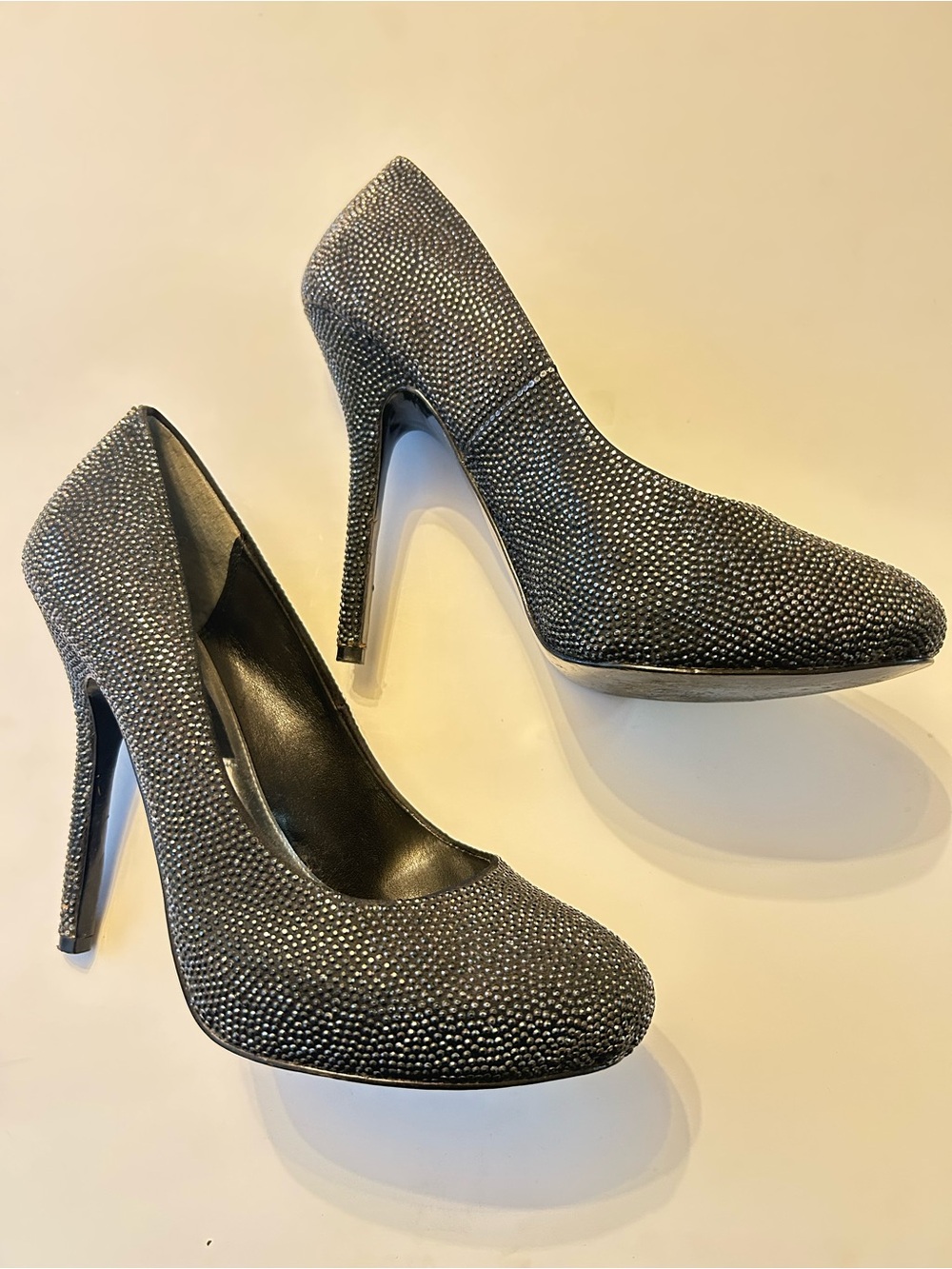Nina New York pumps w/an all-over studded jewel design on a classic stiletto 7